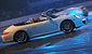 VICKI BUTLER-HENDERSON DRIVES A PORSCHE 911 IN THE LIVE ACTION ARENA